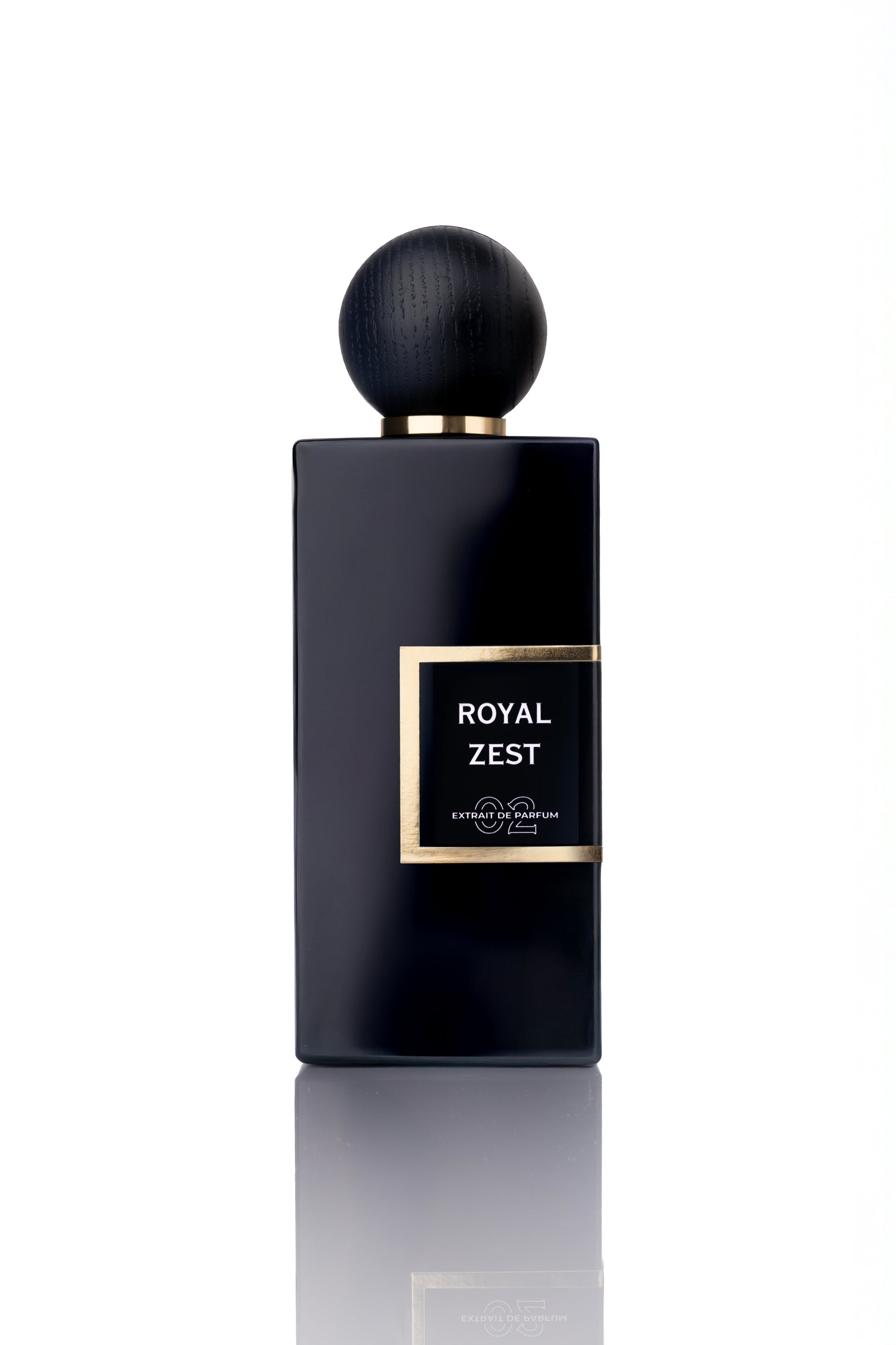 Black perfume bottle labeled 'Royal Zest' on a white background