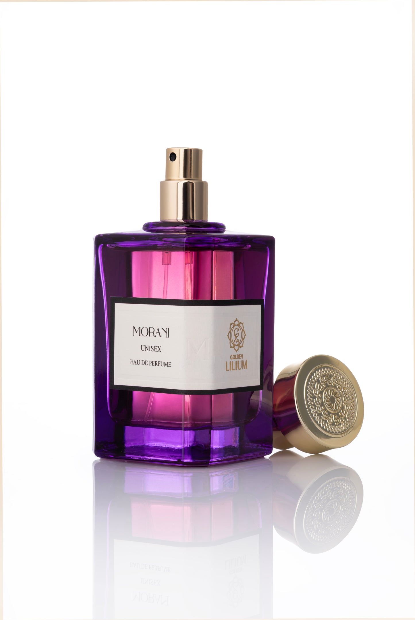 Purple perfume bottle with gold cap on a white background golden lilium morani unisex perfume 100 ml