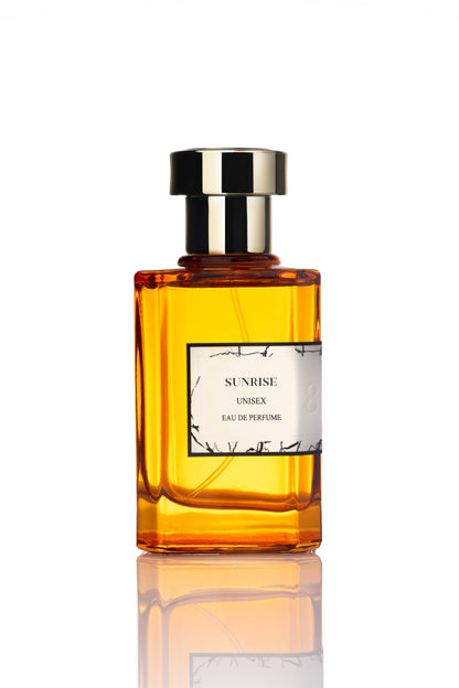 Perfume bottle labeled 'Sunrise' on a white background